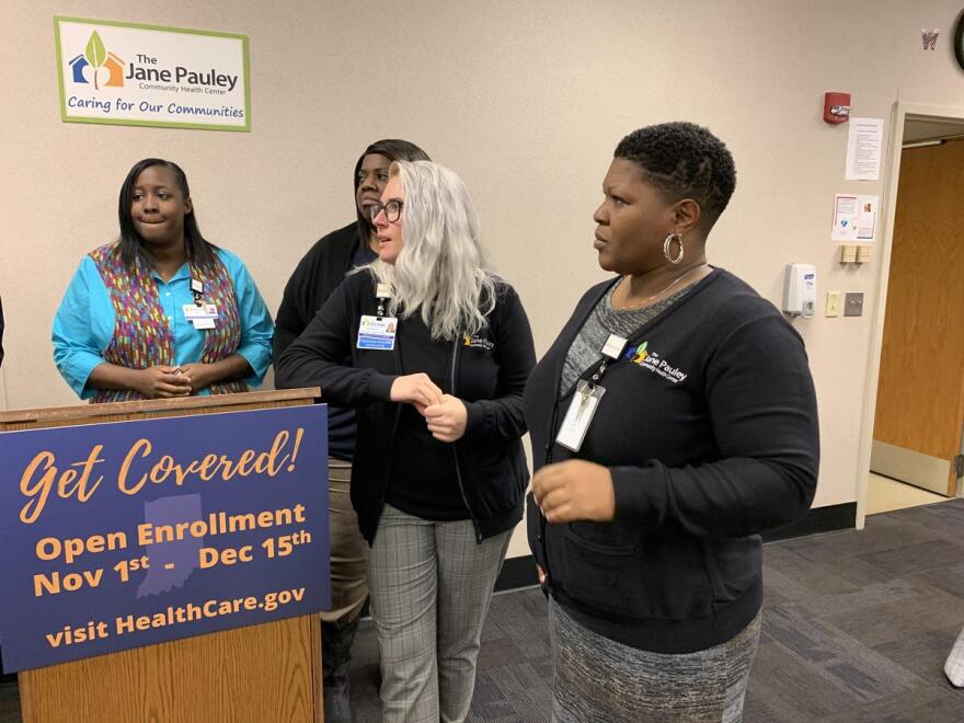 Employees from the Jane Pauley Community Health Center at an open enrollment visit. (Jill Sheridan/IPB News)