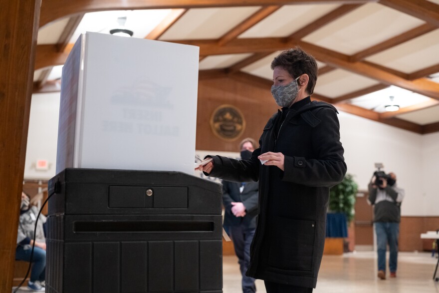 Cara Spencer casts her ballot in the St. Louis Mayoral primary Tuesday, March 2, as she makes her bid to become the city's next mayor.