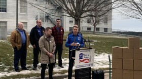 Tim Winkeler, the president of VIP Tires and Service and one of the leading Maine voices behind the "right to repair" citizens initiative, prepares to deliver boxes of more than 70,000 signed petitions to the Maine Secretary of State.