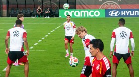 The German Men's National Soccer Team practicing drills.