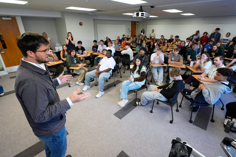 William Lawrence, Democratic candidate for U.S. House of Representatives in Michigan's 7th District speaks on the campus of Michigan State University during a campaign event Tuesday, Sept. 15, 2026, in East Lansing, Mich. (AP Photo/Paul Sancya)