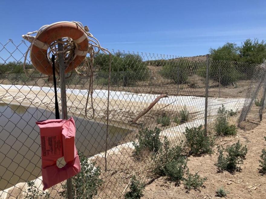 A basin filled with groundwater was used to mix cement for the border wall under construction during President Trump’s first term. This photo was taken in 2021, soon after he left office. (Peter O’Dowd/Here & Now)
