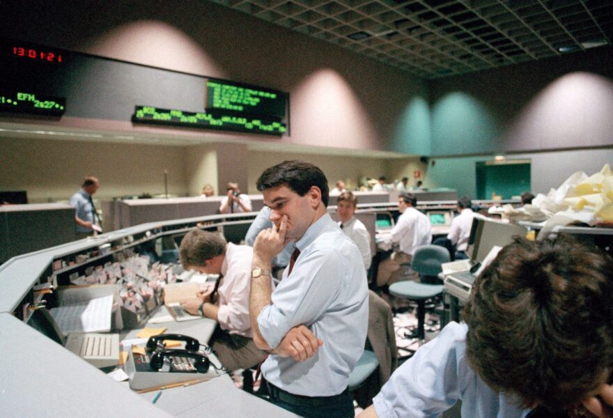 Securities specialist assistant Spencer Varian of Wedbush Securities Co., looks dejected as he watches stock prices plunge on his computer terminal, Oct. 19, 1987, in Los Angeles at the Pacific Stock Exchange. The Pacific Exchange was one of many around the world that felt panic as the Dow Jones average plunged more than 500 points.  (Lennox McLendon/AP)