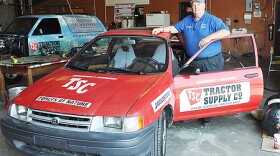 Dr. Cliff Ricketts stands next to the specially adapted 1994 Toyota Tercel that is part of his alternative-fuels fleet of vehicles for a cross-country spring break trip. (MTSU file photo)