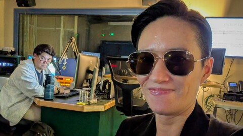 Dyland Reyes (left) and Catherine Shen inside the talk-studio control booth at Connecticut Public.