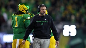 Oregon head coach Dan Lanning calls to his team during the first half of the first round of the NCAA College Football Playoff against James Madison, Saturday, Dec. 20, 2025, in Eugene, Ore.