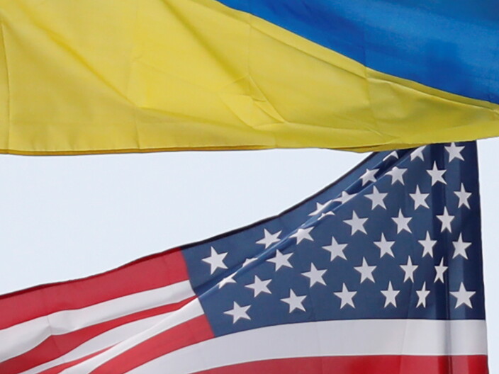 Ukrainian and U.S. flags fly in Kyiv, Ukraine.