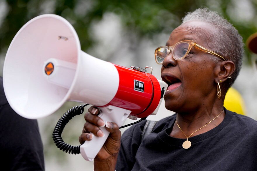 Bertha Manning, of Birmingham speaks on the steps of the Alabama State House after the House voted on HB 1, a redistricting bill, during a special session of the Alabama Legislature, Wednesday, May 6, 2026, in Montgomery, Ala. (AP Photo/Mike Stewart)