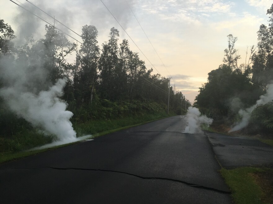 Steaming cracks at 5:57 local time in Leilani Estates subdivision, moments before a fissure opened up on Kaupili Street.