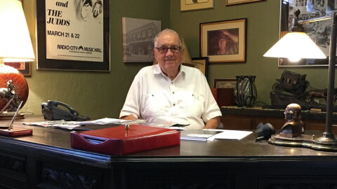 Jim Halsey photographed at his desk in 2017.