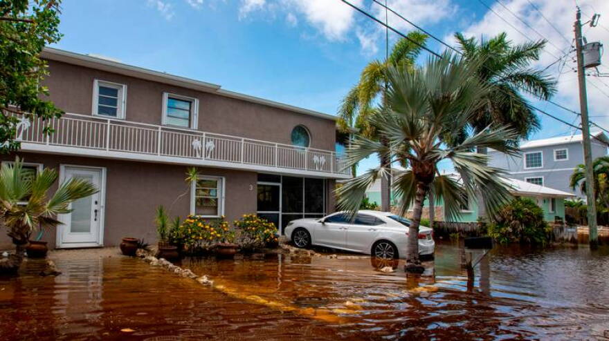 A house sits just above floodwaters off North Blackwater Lane during flooding due to Hurricane Ian.