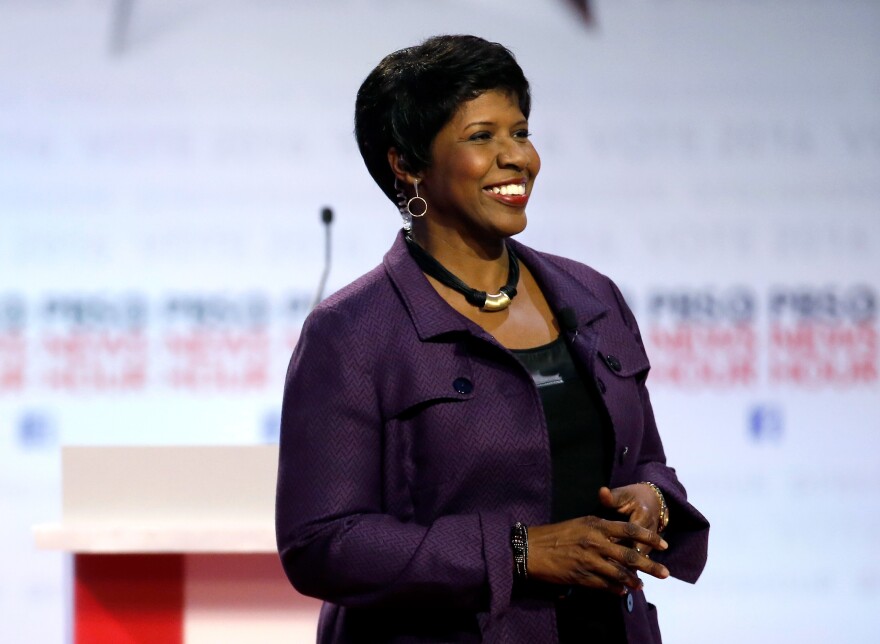 Gwen Ifill takes the stage before moderating a Democratic presidential primary debate at the University of Wisconsin, Milwaukee in February.