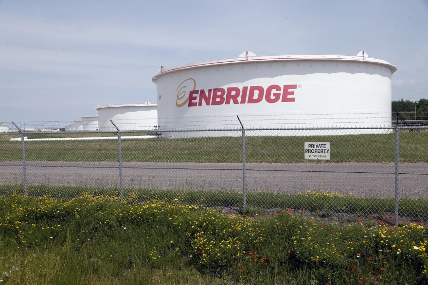 FILE - The corporate name stands out on tanks shown Friday, June 29, 2018 at at the Superior terminal of Enbridge Energy in Superior, Wis.