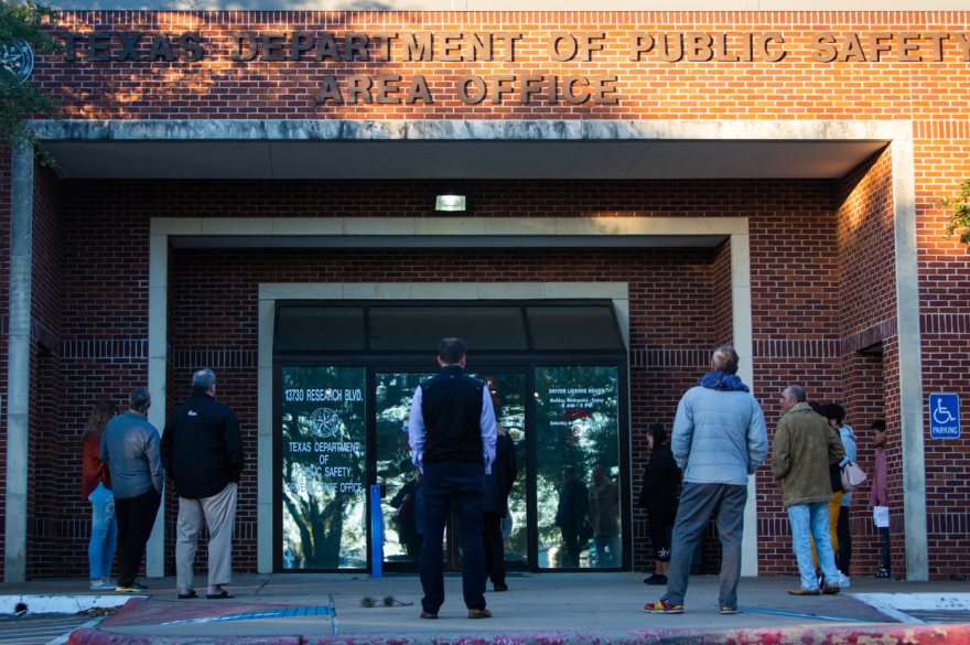 A line begins to form outside the Texas Department of Safety office in northwest Austin shortly before it opens at 8 a.m. on Jan. 24, 2019.