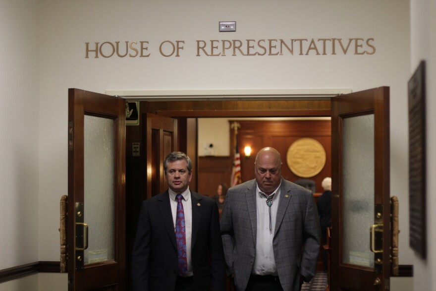 Reps. Chris Tuck, D-Anchorage, and Kevin McCabe, R-Big Lake, leave the House floor session Tuesday, June 1, 2021. (Nat Herz/Alaska Public Media)