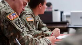 Military members in a classroom