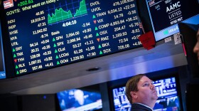 A trader works on the floor of the New York Stock Exchange during the afternoon of February 13, 2015 in New York City. (Andrew Burton/Getty Images)