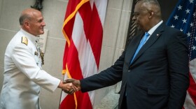 Secretary of Defense Lloyd J. Austin III congratulates Chief of Naval Operations Adm. Michael M. Gilday during Gilday's relinquishment of office ceremony at the U.S. Naval Academy, Annapolis, Maryland, August 14, 2023. Vice Chief of Naval Operations, Adm. Lisa Franchetti, the first woman to be nominated as a service chief and a member of the Joint Chiefs of Staff, will act as CNO until she can be confirmed by the Senate. (DoD photo by Chad J. McNeeley)