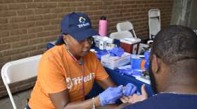 woman conducts a health screening