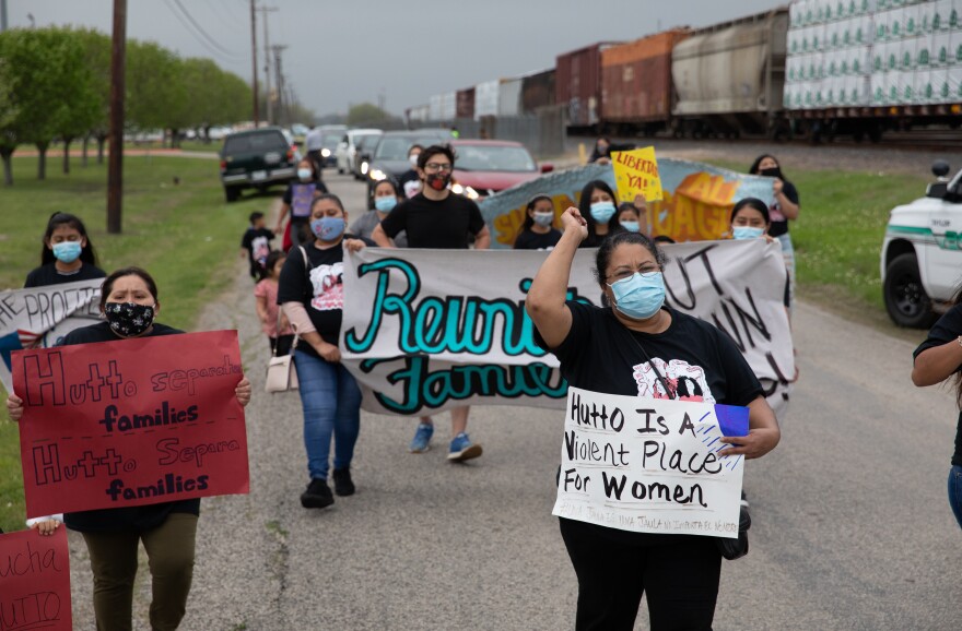 Sonia Mendares, right, is waiting for the release of her 10-year-old daughter from an ICE detention facility in Laredo.