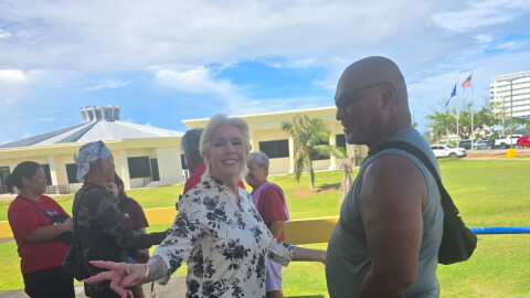 Northern Islands mayoral candidate Keli Tenorio with a supporter.