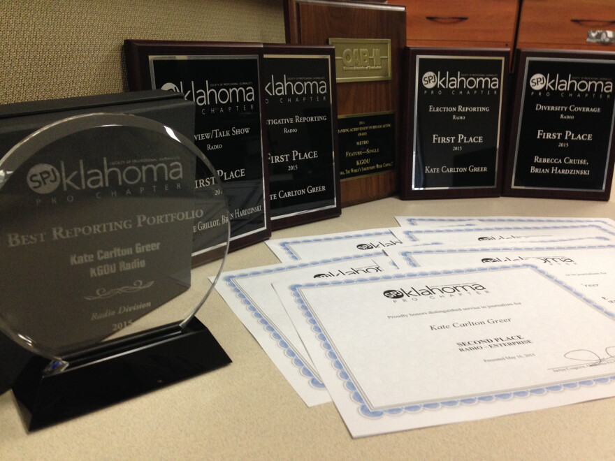 Some of the awards received by KGOU in the spring of 2015.