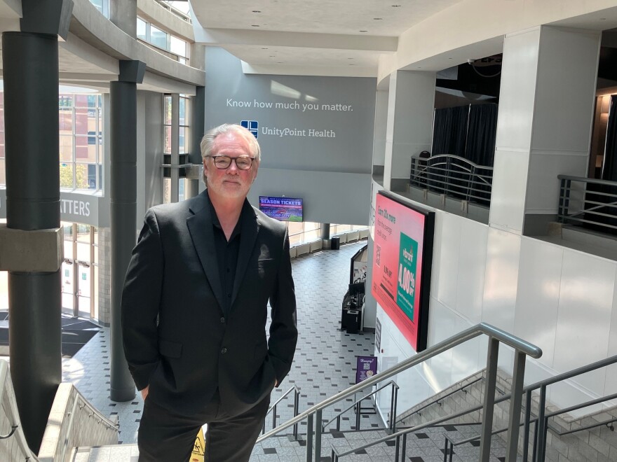 Rik Edgar, new executive director of Vibrant Arena at The MARK, pictured on the top of the steps at the Moline venue, July 22, 2026.