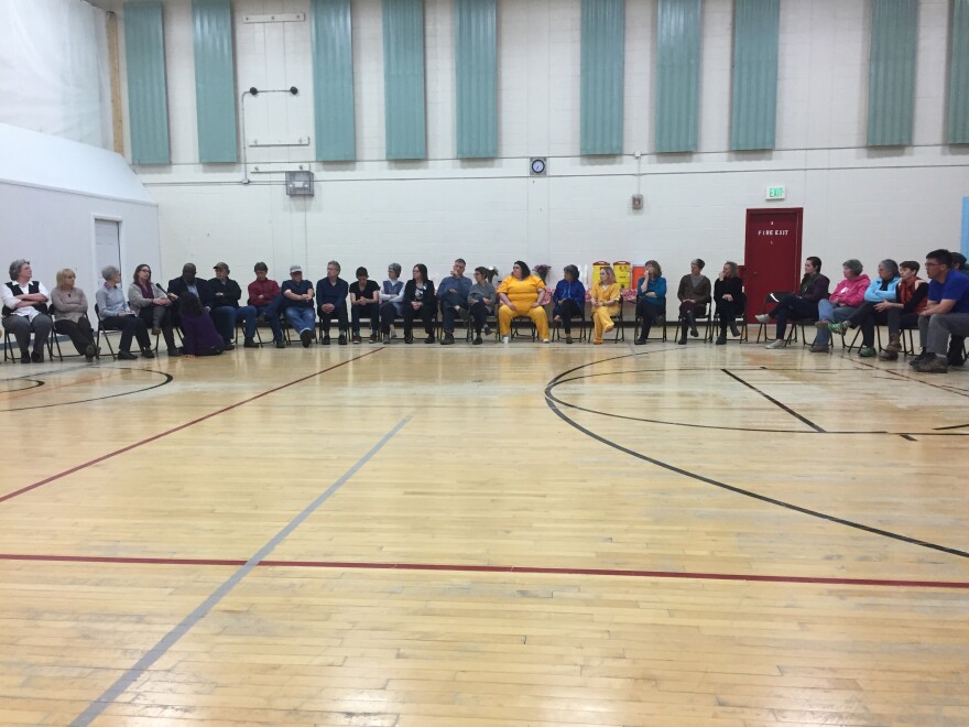 About 70 people sit in a circle for a conversation inside the gym at Fairbanks Correctional Center on May 2, 2018. Photo courtesy of the Dept. of Corrections.