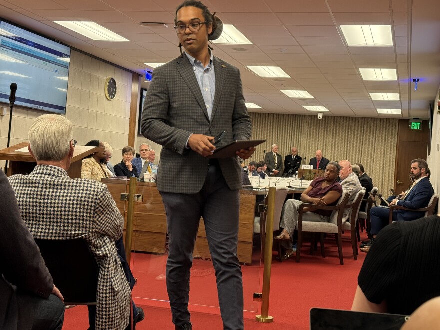 Braxton Winston, the president of the North Carolina AFL-CIO, walks away from a podium after urging a North Carolina State Senate committee to vote against a bill that would ask voters this November to consider putting 'right to work' laws in the state constitution.