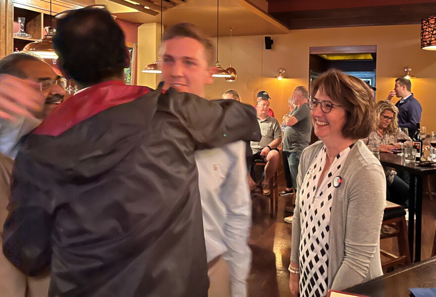 Normal Town Council candidates Kathleen Lorenz, right, and Andy Byars (center) at Stave in Uptown Normal tonight.