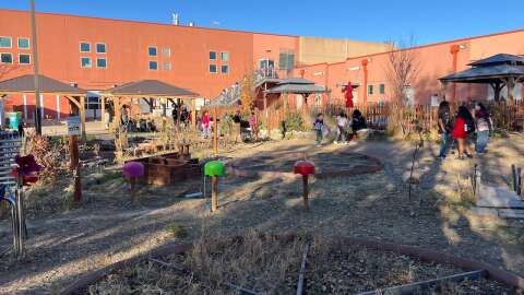 Kids play in a school yard.