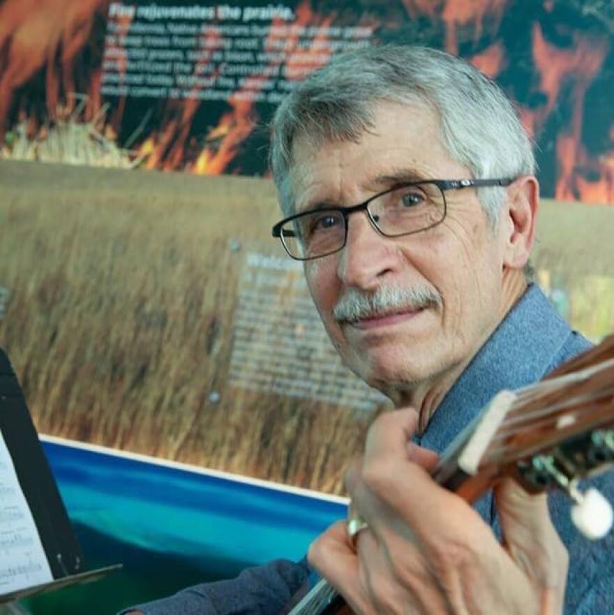 Man playing a guitar