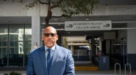 David Arnold Gray, business architect, stands in front of the Overtown Transit Village North