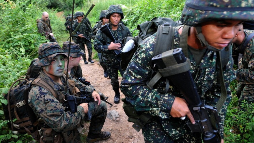 <p>U.S. Marines and their Filipino counterparts take part in a training exercise last year in the Philippines. The U.S. has a history of sending small military contingents abroad.</p>