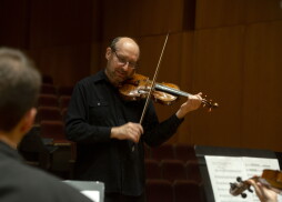 Dr. Leonid Yanovskiy, director of the UWF String Program, conducts the “Runge Strings” Orchestra as they rehearse for their upcoming performance at the University of West Florida.