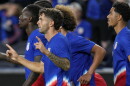 United States forward Christian Pulisic (10) celebrates with teammates after scoring during a friendly soccer match against the New Zealand, Tuesday, Sept. 10, 2024, in Cincinnati.