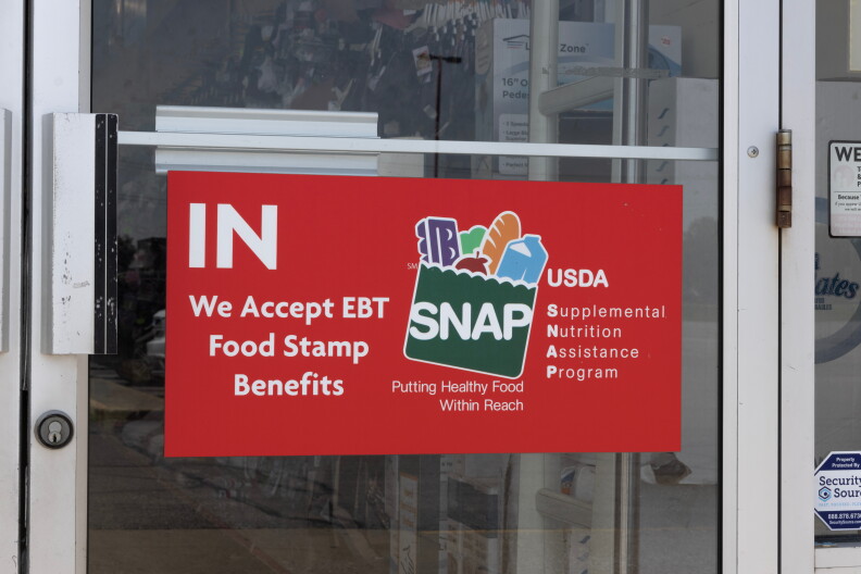 Gas City - July 22, 2025: SNAP and EBT Accepted here sign. SNAP and Food Stamps provide benefits to help the budgets of disadvantaged families.