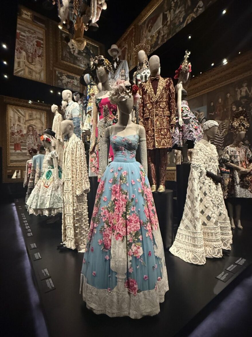 An installation showcasing D&G Alta Moda designs surrounded by paintings by Anh Duong marries historical tradition with contemporary culture in “From the Heart to the Hands: Dolce&Gabbana,” an exhibition at ICA Miami.