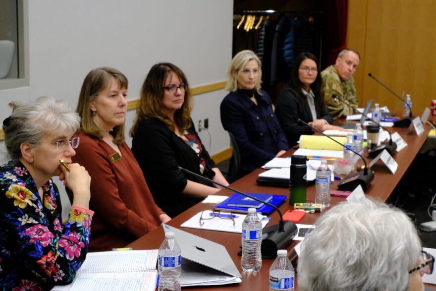 Members of the Alaska State Board of Education: Kimberley Bergey (left), Kathryn McCollum, Sally Stockhausen, education commissioner Deena Bishop (center), Pamela Dupras, and Lt. Col. James Fowley (right), are seen in a board meeting in Juneau on Mar. 11, 2026.
