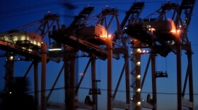 Port of Seattle cranes loom overhead. After a port slowdown last year, retailers and growers are trying to repair the damage of lost business.