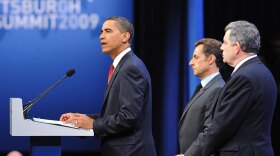 President Obama speaks as French President Nicolas Sarkozy (center) and British Prime Minister Gordon Brown look on during a media briefing on the sidelines of the G-20 meetings Friday in Pittsburgh. The U.S., Britain and France asked the IAEA for immediate access to a newly disclosed Iranian nuclear facility.