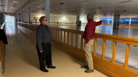 Covington City Manager David Johnston and Communications Manager Dan Hassert look at the massive vacant space once occupied by the IRS for 52 years.