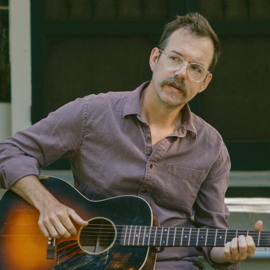 Daniel Kimbro playing guitar