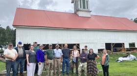New Hampshire Preservation Alliance reps, NH Barn Committee members and friends visit an active rehabilitation project in Boscawen.