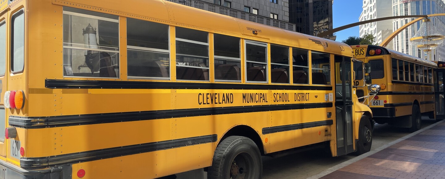 A line of Cleveland Metropolitan School District school buses parked in Cleveland's Playhouse Square in fall 2022.