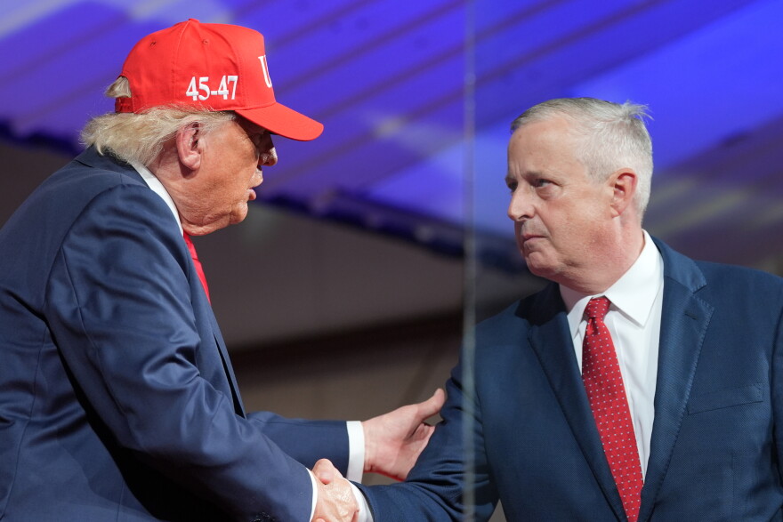President Donald Trump greets North Carolina Republican U.S. Senate candidate Michael Whatley during a rally at Gastonia Municipal Airport, Wednesday, Sept. 16, 2026, in Gastonia, N.C.