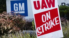 In this Sept. 23, 2019, file photo a sign is posted during a demonstration outside a General Motors facility in Langhorne, Pa. (Matt Rourke, File/AP)