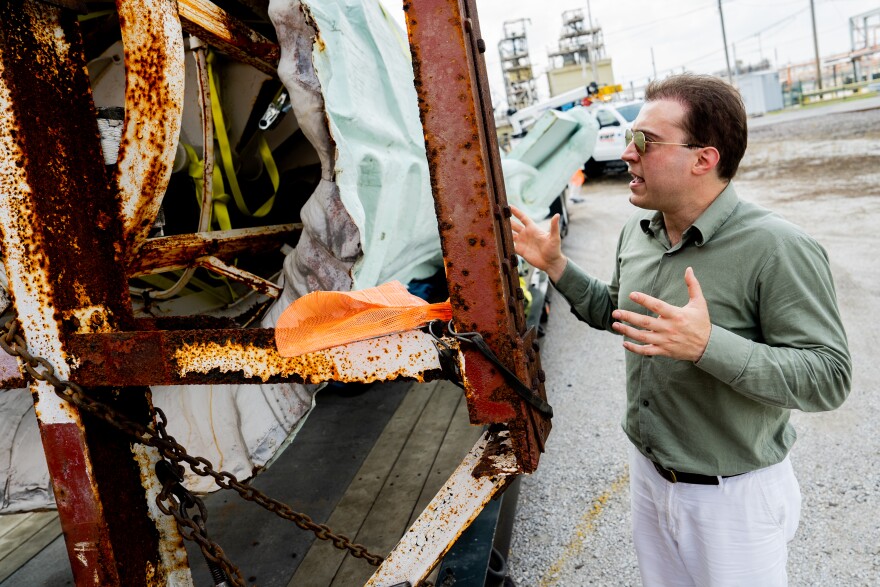  Frank Trampe looks at rusted out frame to a Statue of Liberty replica