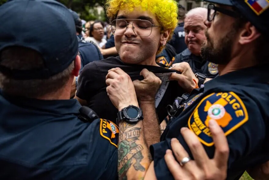 A student protester is dragged out from the crowd and arrested during a pro-Palestinian demonstration at the University of Texas at Austin on April 24, 2024. A new survey found the Israel-Hamas war had become one of the most difficult topics for faculty to discuss on their campuses. More professors across the country are self-censoring themselves for fear of losing their jobs or other forms of retaliation, the survey found.