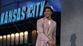 Alabama quarterback Bryce Young reacts after being chosen by Carolina Panthers with the first overall pick during the first round of the NFL football draft, Thursday, April 27, 2023, in Kansas City, Mo.